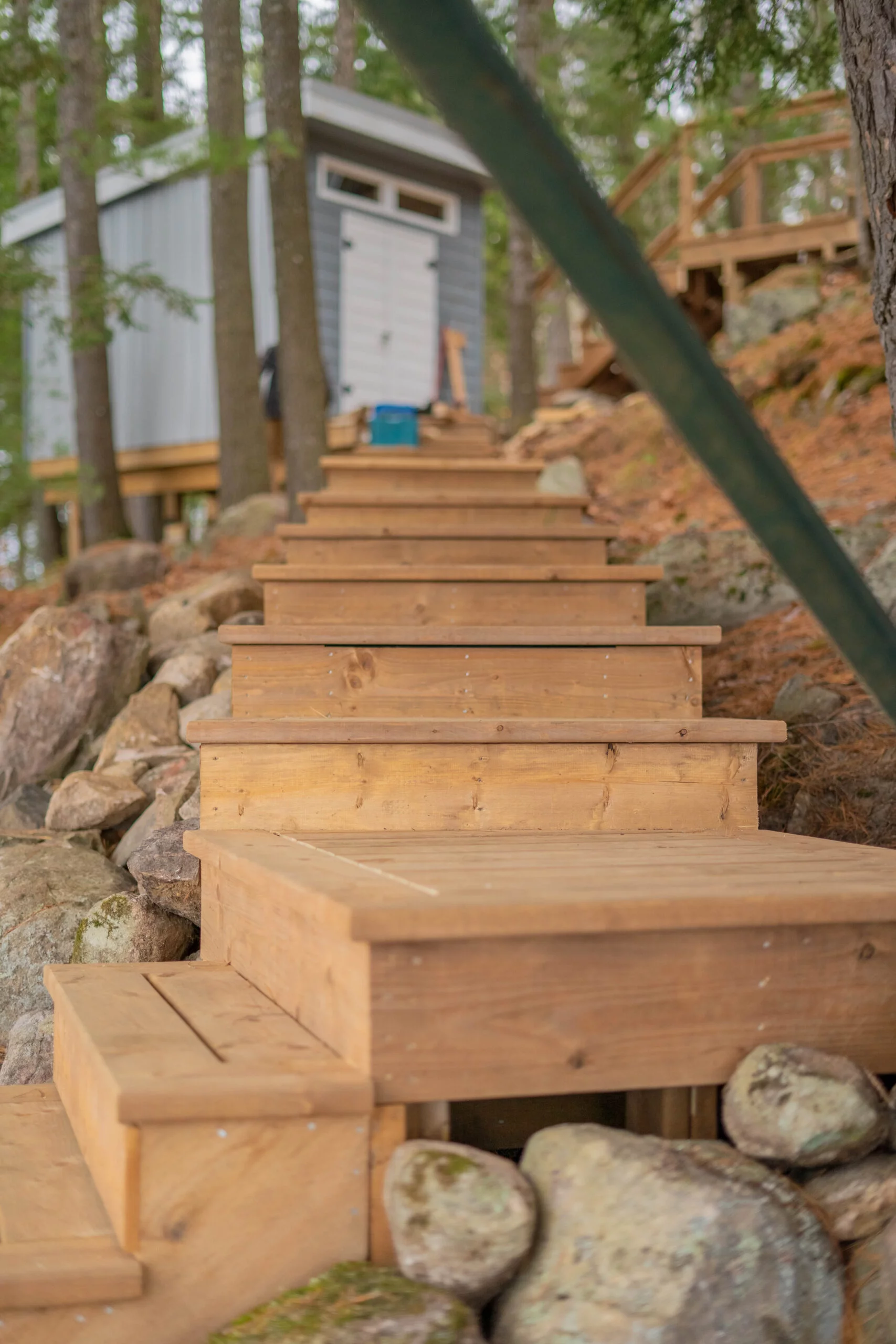 Wooden stairs in construction by Lakeview Decks